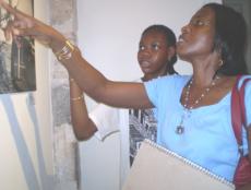 Gwen, right, and Javeysa Lake looking at art by Carmen Mojica. Gwen, right, and Javeysa Lake looking at art by Carmen Mojica.